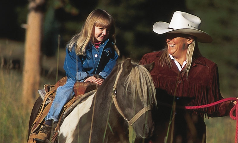 Young girl Horseback Riding at Copper Mountain